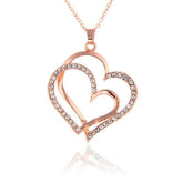Interlocking Gold Hearts - Downtown Girl